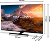A television screen displaying a scenic landscape, with dimensions and measurements overlaid. Produktbild-Vorschau