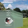 A diagram showing the height adjustment options of a green pop-up gazebo against a backdrop of trees and sky. Produktbild-Vorschau