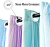 Close-up of grommet curtains in various colors hanging on a rod. Náhled obrázku produktu