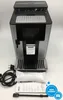 A De'Longhi coffee machine is shown with accessories and packaging. Produktbild-Vorschau