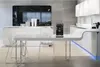 A modern kitchen with a white table and chairs, and a black coffee machine on the table. Anteprima dell’immagine prodotto