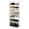 A white, multi-tiered shoe rack filled with various types of shoes. Produktbild-Vorschau