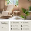 A living room scene with a rocking chair, a side table, and plants. Produktbild-Vorschau