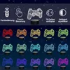A collage of 3D illusion lamps shaped like game controllers, displayed in various colors against a starry night background. The top section features icons and text describing product features like remote control, touch control, 16 color options, and adjust Náhled obrázku produktu