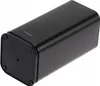A black knife block is shown from a low angle, resting on a white surface. Voir les images du produit