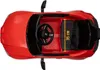 Overhead view of a red toy electric car. Voir les images du produit