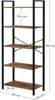 A tall, narrow bookshelf with a rustic wood grain finish and a black metal frame, shown with dimensions indicated. Produktbild-Vorschau
