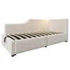 A beige upholstered daybed with a slatted mattress base is shown against a white background. Voir les images du produit