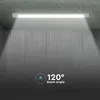 A linear LED light fixture mounted on a concrete ceiling, illuminating a concrete wall with a wide beam angle. Náhľad obrázku produktu