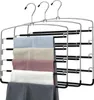A multi-tiered hanger with several pairs of pants folded over it. Produktbild-Vorschau