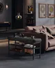 A modern living room with a couch, shelving unit, and a shoe bench with storage. Náhled obrázku produktu