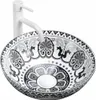 A white countertop washbasin with a decorative pattern and a white faucet. Náhled obrázku produktu