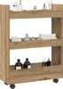 A three-tier storage cart with various bathroom or cosmetic products on its shelves. Voir les images du produit