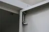 A close-up view of a metal cabinet hinge mechanism. Produktbild-Vorschau