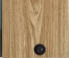 A close-up view of a wooden cabinet with a black circular switch. Náhled obrázku produktu
