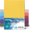 A yellow fitted sheet is shown, with other colored sheets stacked behind it. Produktbild-Vorschau