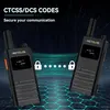 Two walkie-talkies are shown with a digital background and security icons. Produktbild-Vorschau