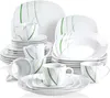 A collection of white ceramic dinnerware with green line accents, arranged in a studio shot. Náhled obrázku produktu