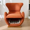 A close-up shot of an orange armchair with a built-in pet bed. Náhled obrázku produktu