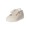 A single beige sneaker is shown against a white background. Náhled obrázku produktu