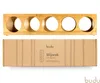 A bamboo wine rack and its packaging are displayed against a white background. Produktbild-Vorschau