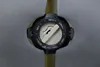 A close-up view of a dial with markings and a lever, likely part of a sewing machine or similar device. Náhľad obrázku produktu