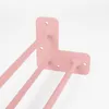 A close-up shot of pink hairpin legs for furniture, mounted on a white background. Podgląd zdjęcia produktu