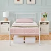 A white metal bed frame with a pink mattress and pillow, set up in a bedroom with two white nightstands. Produktbild-Vorschau