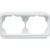 A white electrical outlet frame with two openings. Anteprima dell’immagine prodotto