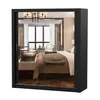 A black wardrobe with mirrored doors reflecting a bedroom interior. Produktbild-Vorschau