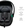 A close-up of a gray baby car seat with informational icons and text on the right side. Produktbild-Vorschau