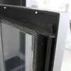 Close-up of the seal and frame of a fireplace door. Produktbild-Vorschau