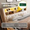 A bed with a headboard featuring integrated shelves and lighting, showcasing charging ports. Náhľad obrázku produktu