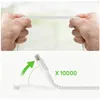 A collage showing a white braided USB-C to USB-C cable. The top image shows hands stretching the cable to demonstrate its flexibility and durability. The bottom image shows the cable bending at a 90-degree angle with an arrow indicating repeated bending, a Voir les images du produit