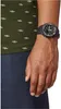 A person's arm wearing a watch. Produktbild-Vorschau
