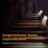 A person walking up a dark staircase with motion-activated lights illuminating the steps. Produktbild-Vorschau