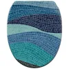 A toilet seat with a mosaic wave pattern in various shades of blue and teal. Produktbild-Vorschau