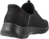 A black Skechers slip-on shoe is shown from the back and side against a white background. Voir les images du produit