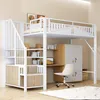 A white loft bed with stairs, desk, and wardrobe, set up in a room. Náhled obrázku produktu
