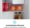 Inside a mini-refrigerator, showing cans of cola, apples, and bottles of juice on shelves. Produktbild-Vorschau