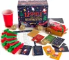 A collection of Christmas-themed party games and accessories laid out on a white surface. Produktbild-Vorschau