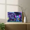 A framed painting of Stitch and Toothless is displayed on a wooden cabinet next to a white vase with branches. Produktbild-Vorschau