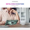 A person is sitting at a table with a phone case on it, next to a cup. Produktbild-Vorschau