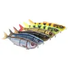 A line of fishing lures shaped like fish, arranged diagonally on a white background. Náhled obrázku produktu