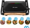 A black electric grill with a wooden handle, shown with circular images of food items it can cook. Produktbild-Vorschau