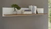 A wall shelf with books and a small plant. Produktbild-Vorschau