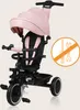 A pink and black multifunctional tricycle is shown against a light beige background. Produktbild-Vorschau
