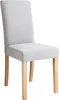 A single gray upholstered dining chair with light brown wooden legs, shown against a white background. Náhled obrázku produktu
