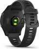 The back of a black Garmin Forerunner 955 smartwatch is shown, highlighting the heart rate sensor and charging contacts. Náhled obrázku produktu