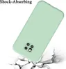 A light green phone case is shown falling onto a cracked surface, illustrating its shock-absorbing feature. Produktbild-Vorschau